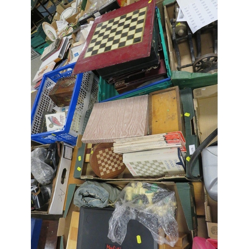 175 - Three trays of assorted chess sets and chess boards both traditional and electronic (all unchecked)