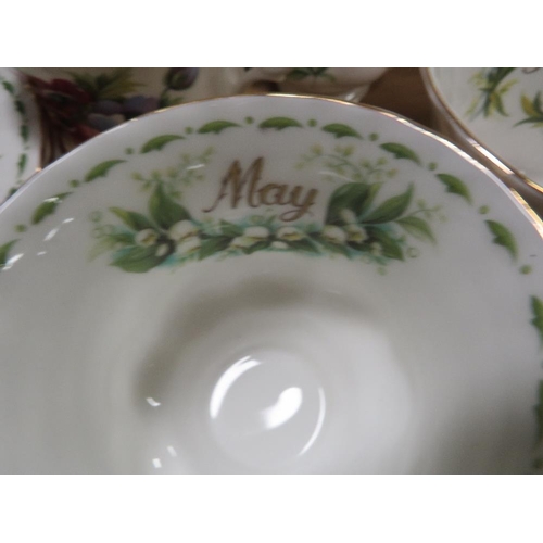 69 - A tray of Royal Albert 'Flowers of the Month' trios together with a tray of Wedgwood calendar plates