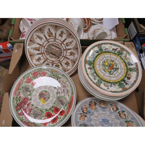 69 - A tray of Royal Albert 'Flowers of the Month' trios together with a tray of Wedgwood calendar plates