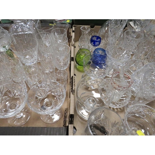 74 - Two trays of assorted cut glass to include decanters etc