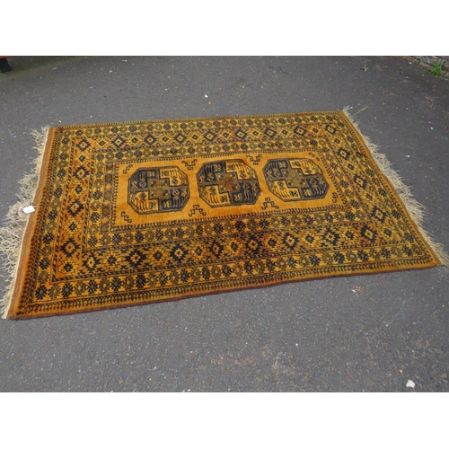 776 - An Eastern woollen rug