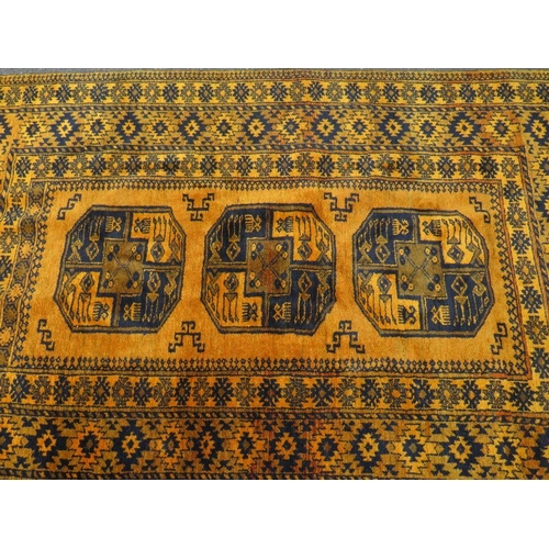 776 - An Eastern woollen rug