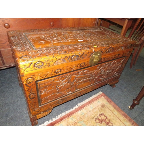 782 - An Eastern carved hardwood blanket box W 100 cm