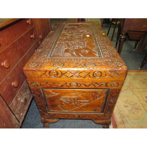 782 - An Eastern carved hardwood blanket box W 100 cm