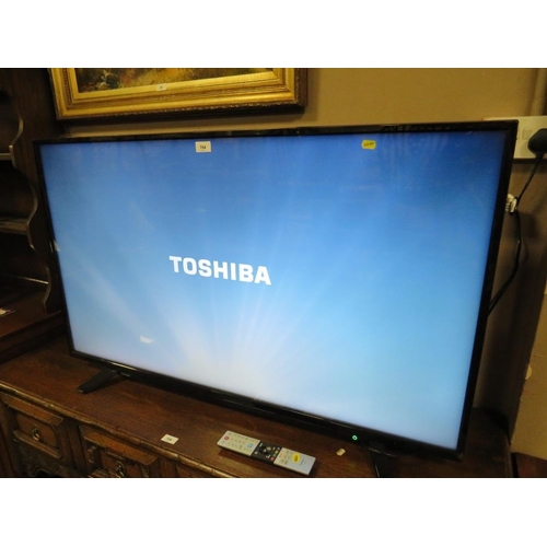 784 - A Toshiba 50 inch flatscreen television with remote