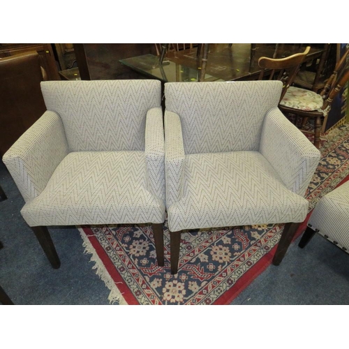 789 - A pair of modern upholstered armchairs