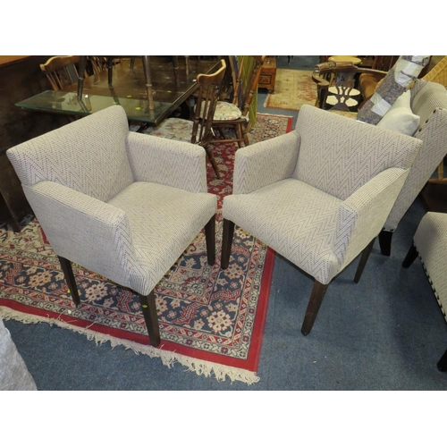 789 - A pair of modern upholstered armchairs