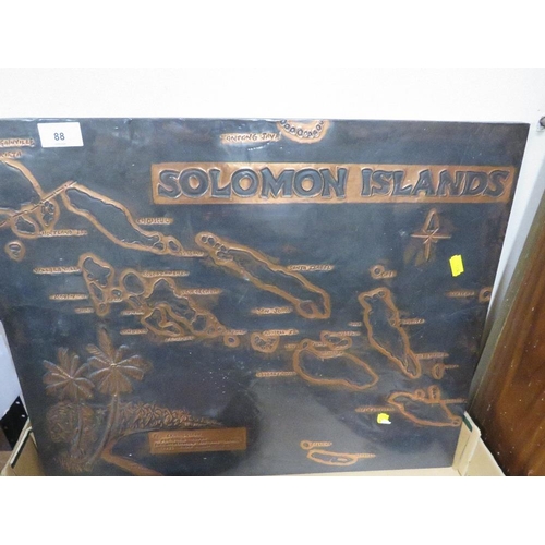 88 - An Oceanic Polynesian New Zealand Maori war club, a copper covered map of the Solomon Islands and a ... 