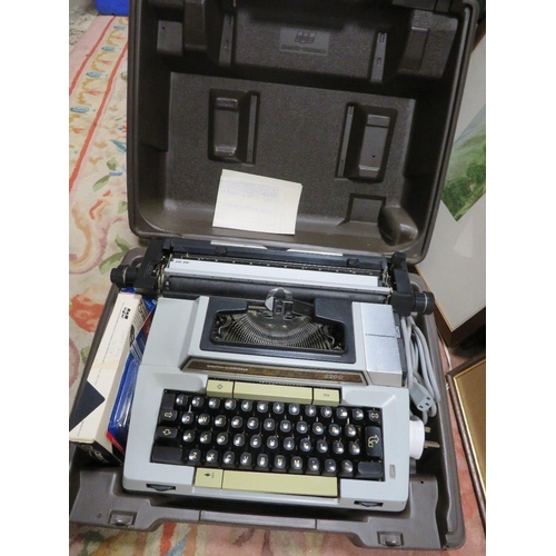 91 - A vintage Smith Corona portable typewriter together with a smaller example