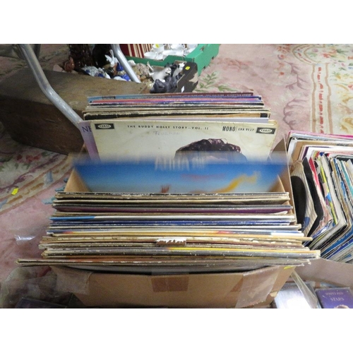 82 - A collection of assorted LP records and 7