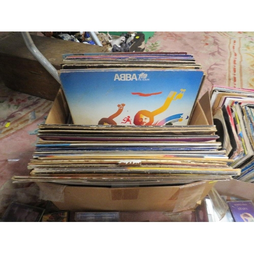 82 - A collection of assorted LP records and 7