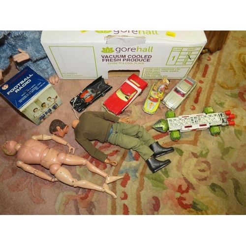 83 - A selection of vintage toys etc., to include Action Man, Dinky toys, a carved wooden angel, various ... 