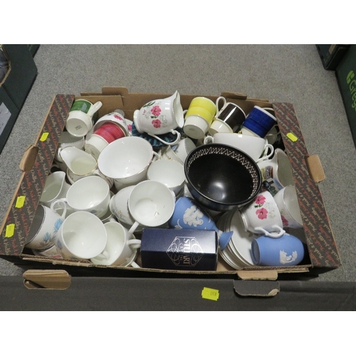 211 - Four trays of assorted ceramics and glassware