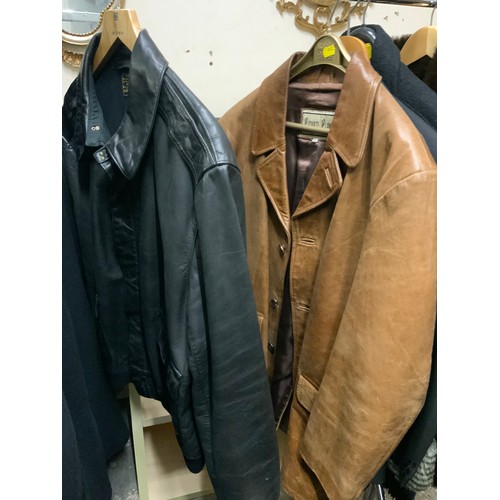 45 - A vintage black 'Crombie' three-quarter length overcoat, together with two leather coats, a vintage ... 