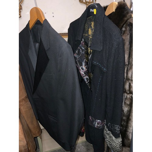 45 - A vintage black 'Crombie' three-quarter length overcoat, together with two leather coats, a vintage ... 