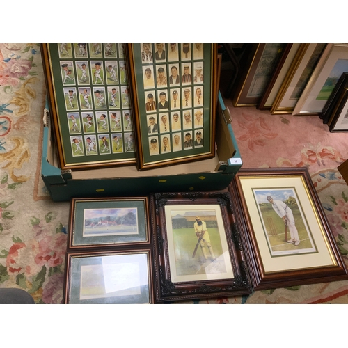 32 - A tray of assorted pictures and prints to include predominantly cricketing examples and cigarette ca... 