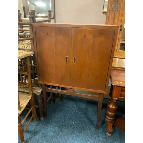 778 - A mid-century Timeless Trend teak drinks cabinet on stand H 127 cm W 84 cm