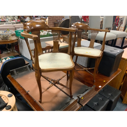 803 - A pair of Edwardian inlaid armchairs