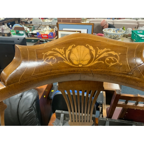 803 - A pair of Edwardian inlaid armchairs