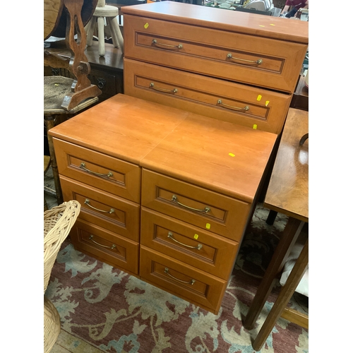 807 - A modern chest of drawers together with a pair of bedside chests