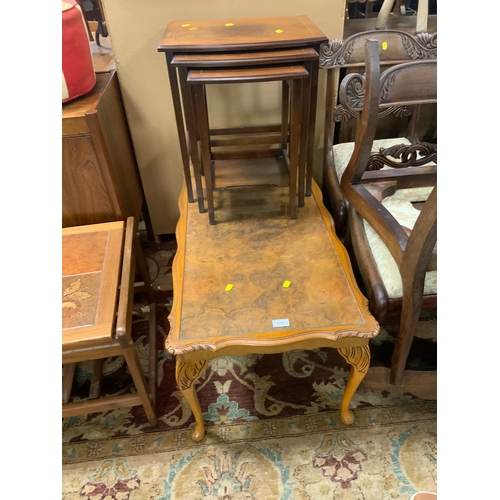 819 - A walnut reproduction coffee table, and a mahogany nest of reproduction tables