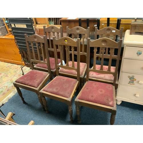 828 - A set of six Edwardian oak dining chairs