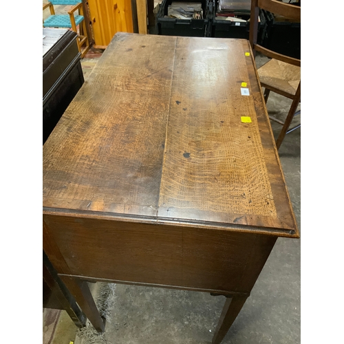 835 - A Georgian oak and mahogany crossbanded lowboy