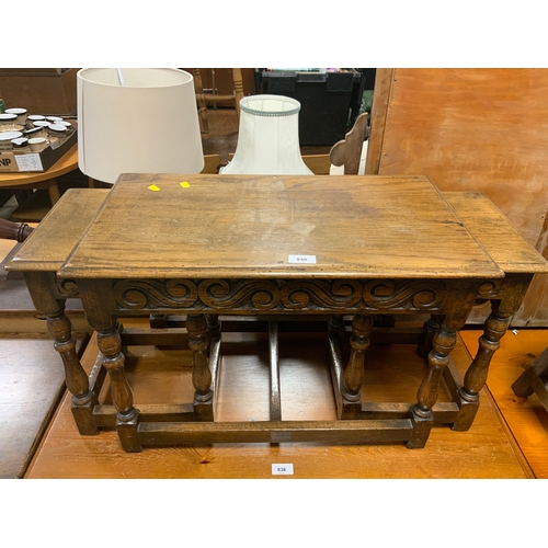 840 - An oak carved nest of tables