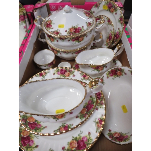 103 - A large collection of Royal Albert Old Country Roses tea and dinner ware to include tureens, coffee ... 