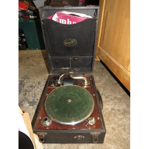 114 - A vintage Edison Bell wind up gramophone together with a case of 78