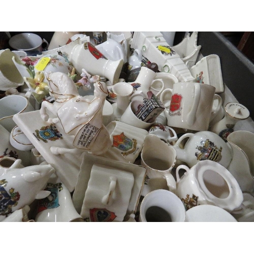 126 - Two trays containing a large quantity of crested ware etc