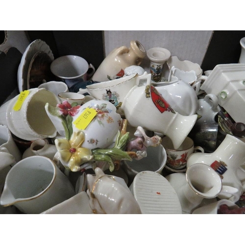 126 - Two trays containing a large quantity of crested ware etc