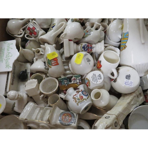 126 - Two trays containing a large quantity of crested ware etc