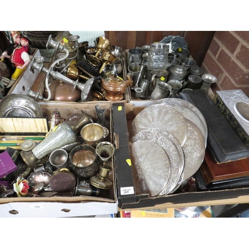 135 - Four trays of assorted metal ware to include pewter tankards, silver plated placemats, flatware etc