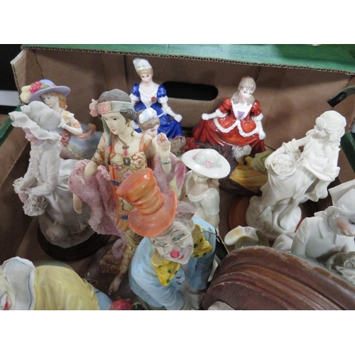 141 - A box containing approximately 34 ornaments