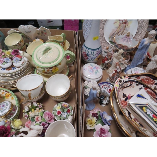 146 - Two trays of assorted ceramics to include Mason's Blue Mandalay Ironstone, a Poole vase, figurines e... 