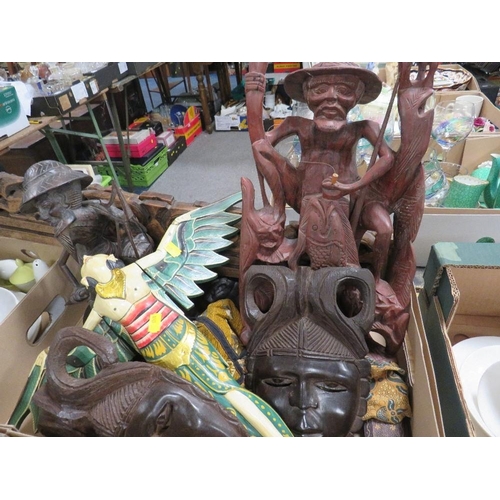 150 - A tray of assorted treen etc. to include Oriental figures, tribal style masks etc