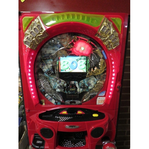 53 - A vertical Japanese pinball machine with video display