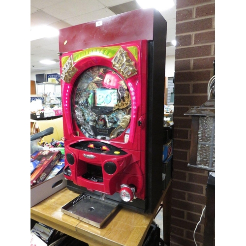 53 - A vertical Japanese pinball machine with video display