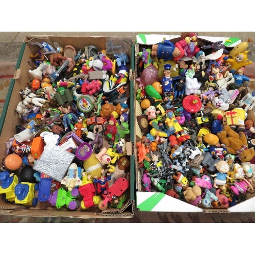 61 - Two trays of assorted vintage McDonalds happy meal toys and other similar examples