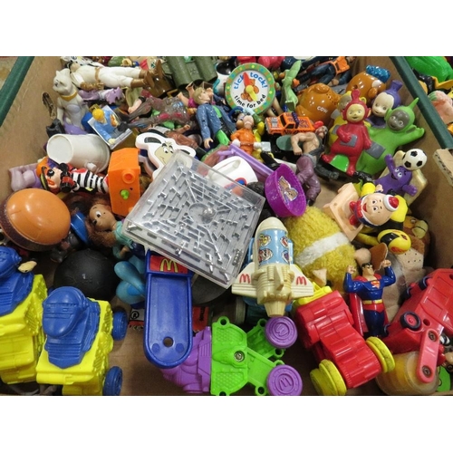 61 - Two trays of assorted vintage McDonalds happy meal toys and other similar examples