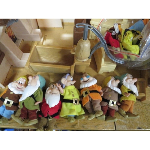 62 - A vintage Disney Snow White and the Seven Dwarfs cottage with figures and furniture