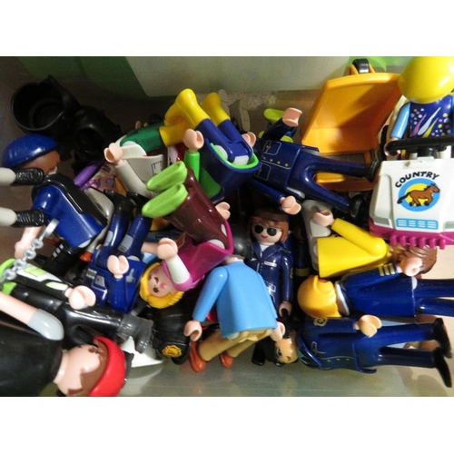 64 - A tray of various Playmobil items to include a boxed city action airport