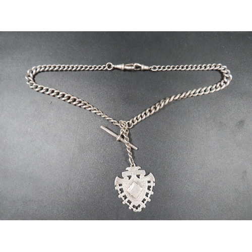 A hallmarked silver graduating Albert chain together with an antique ...