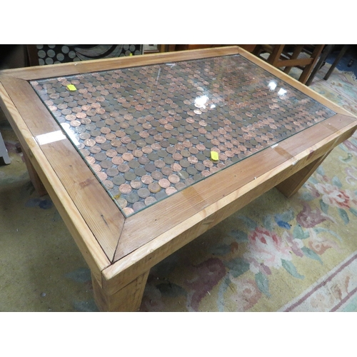 833 - A penny decorated coffee table