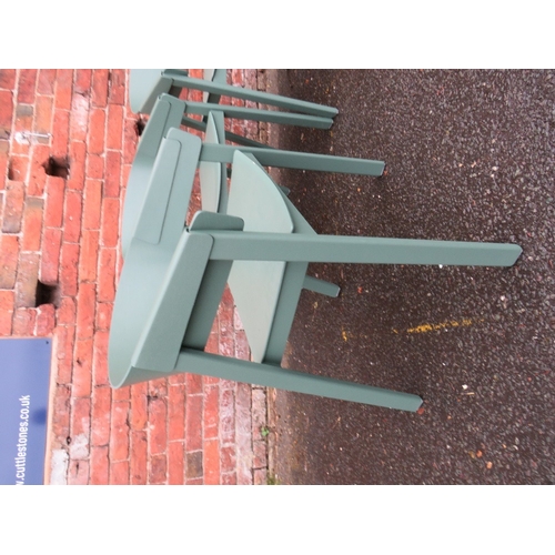 842 - A set of four green 'Muuto' cover armchairs designed by Thomas Bentzen (Ash veneer with beech legs)