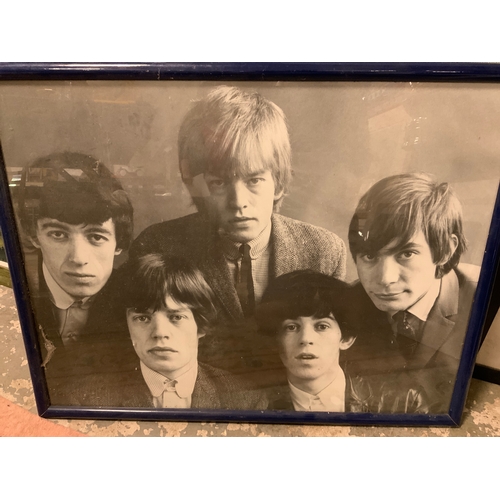 222 - An unframed John Lennon picture together with a framed Rolling Stones photograph and a picture of Wi... 