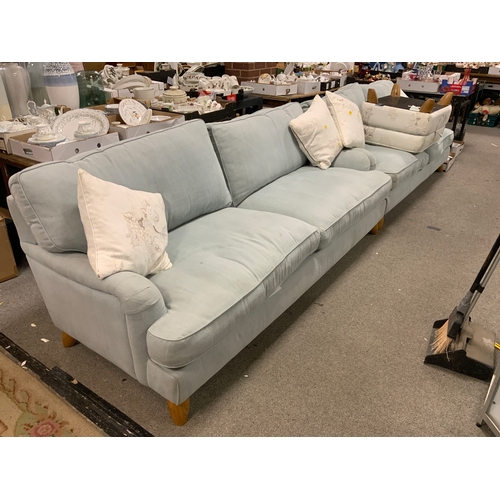 849 - Two large Ercol upholstered sofas together with an Ercol storage stool in different fabric