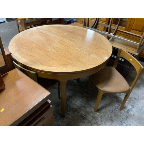 853 - A mid-century Nathan teak extending table and four chairs A/F