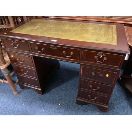 873 - A reproduction mahogany twin pedestal desk with green tooled leather top W 110 cm